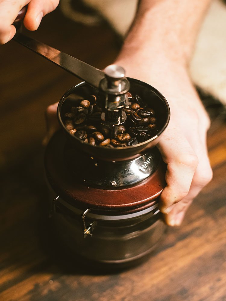 One of the authentic things to do in Cartagena is to try your hand at coffee grinding and tasting the true coffee of Colombia